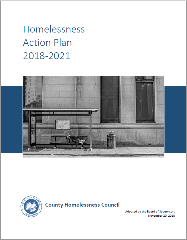 Cover of Homeless action plan report with a photo of civic building with bus stop