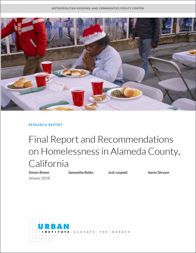 Cover from the Urban Institute Report on Homelessness in Alameda County; a homeless person wearing a Santa hat praying over a meal set up on folding tables outside