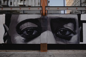 a mural in black and white focusing on a George Floyd's eyes